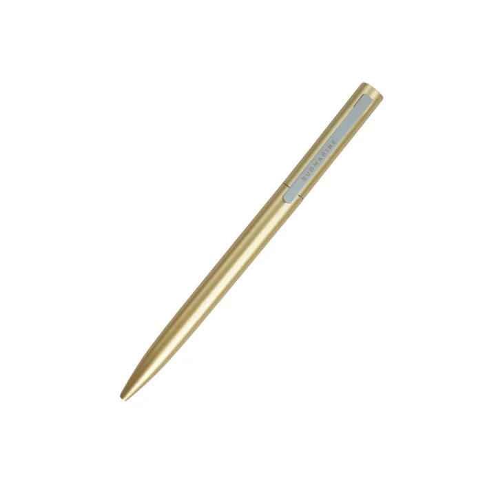 Gold pen on a white background