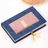 Blue decorative box with a transparent lid showing a blush color, on a white background.