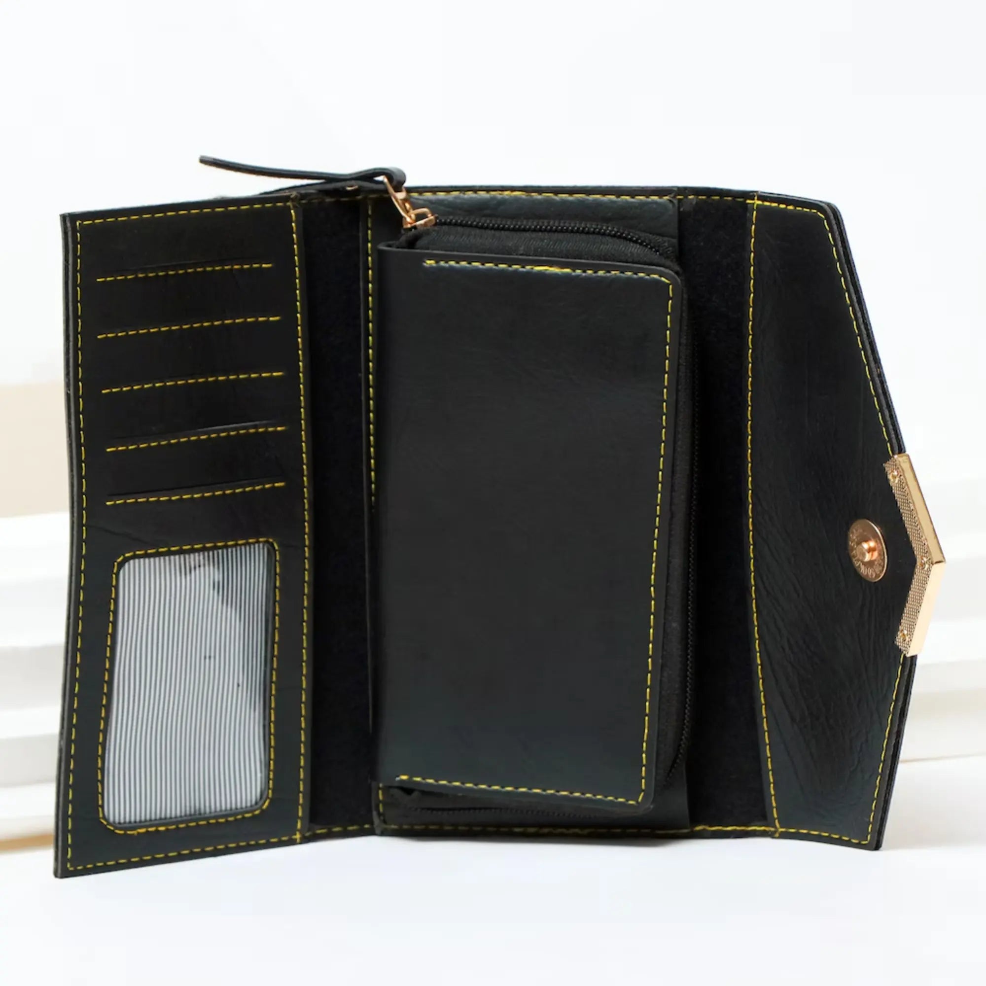 Black leather wallet with gold stitching on a white background