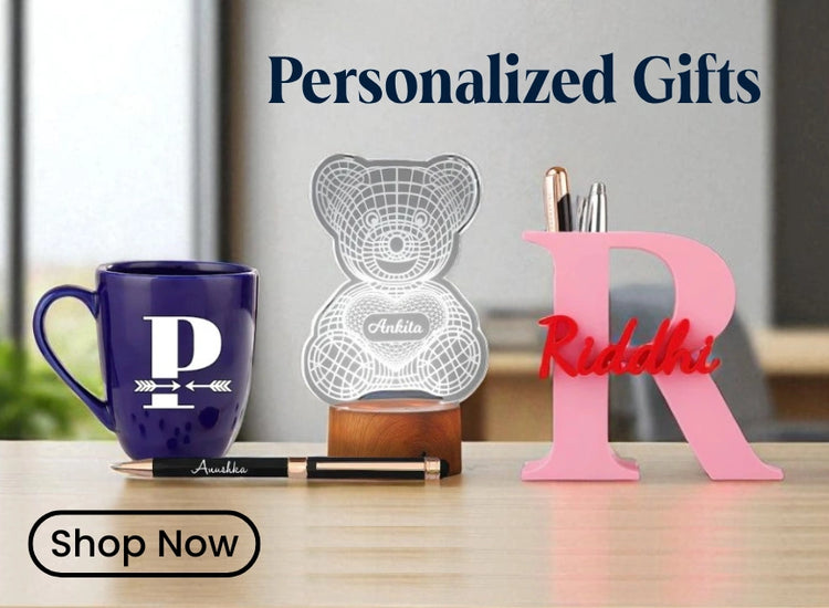 Personalized gifts including a mug, lamp, and letter 'R' on a table.