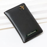 Black leather wallet with gold emblem and 'Suhani' branding on a white background
