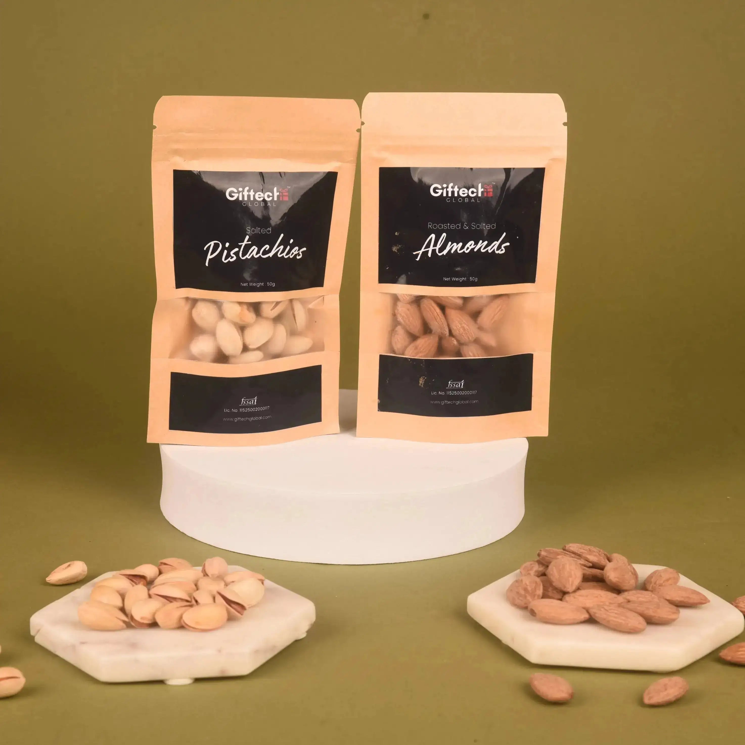 Packs of pistachios and almonds from the Festive Gift Hamper, ideal for Diwali gifting and gourmet dry fruit assortments.