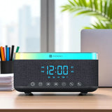 Digital clock radio on a desk with a blurred office background