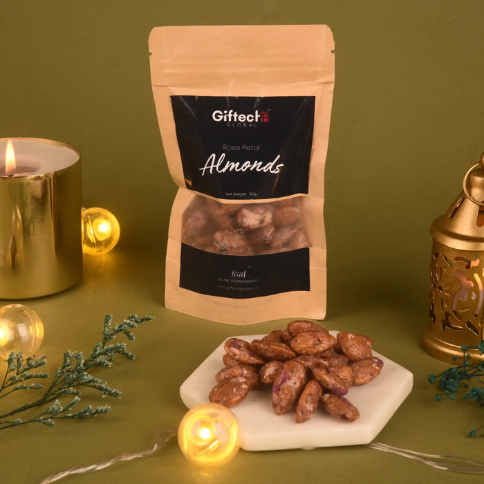 Rose Petal Almonds - Unique Floral Treat | 50g pack of roasted almonds coated with rose petals, displayed with festive lights and decor.