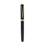 Black pen with gold accents on a white background