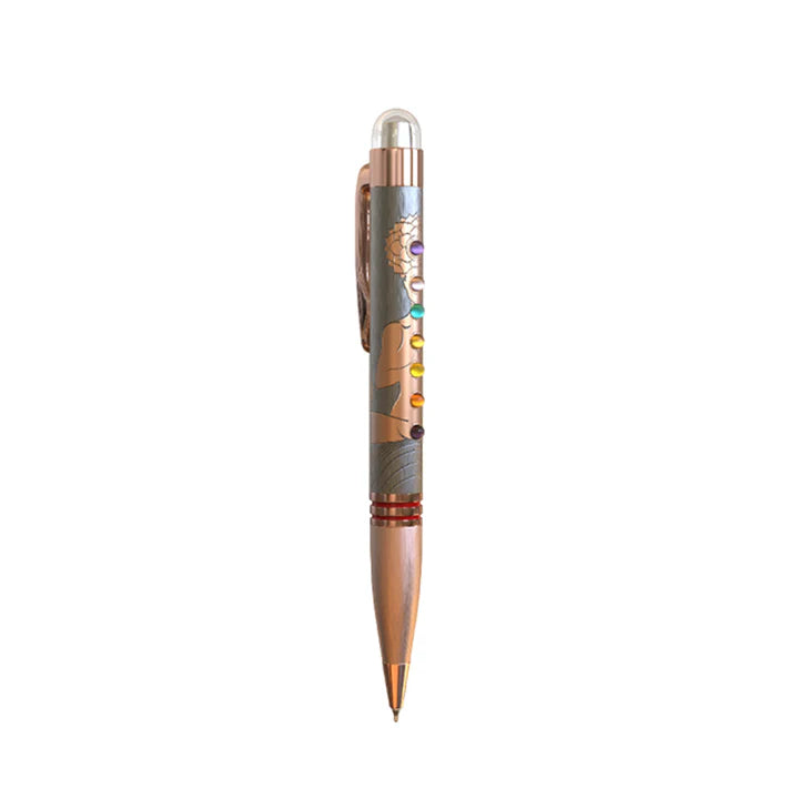 Pen with decorative cap on a white background