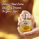 Woman holding Smokin' Vanilla Eau De Parfum bottle, highlighting its elegant design and bold vanilla caramel scent.