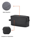 Black toiletry bag with water repellent feature and organization design on a white background