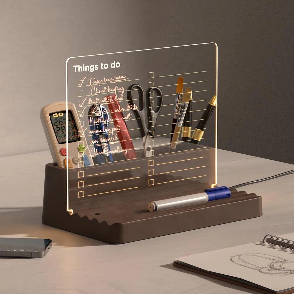 Desk organizer with stationery items on a neutral background