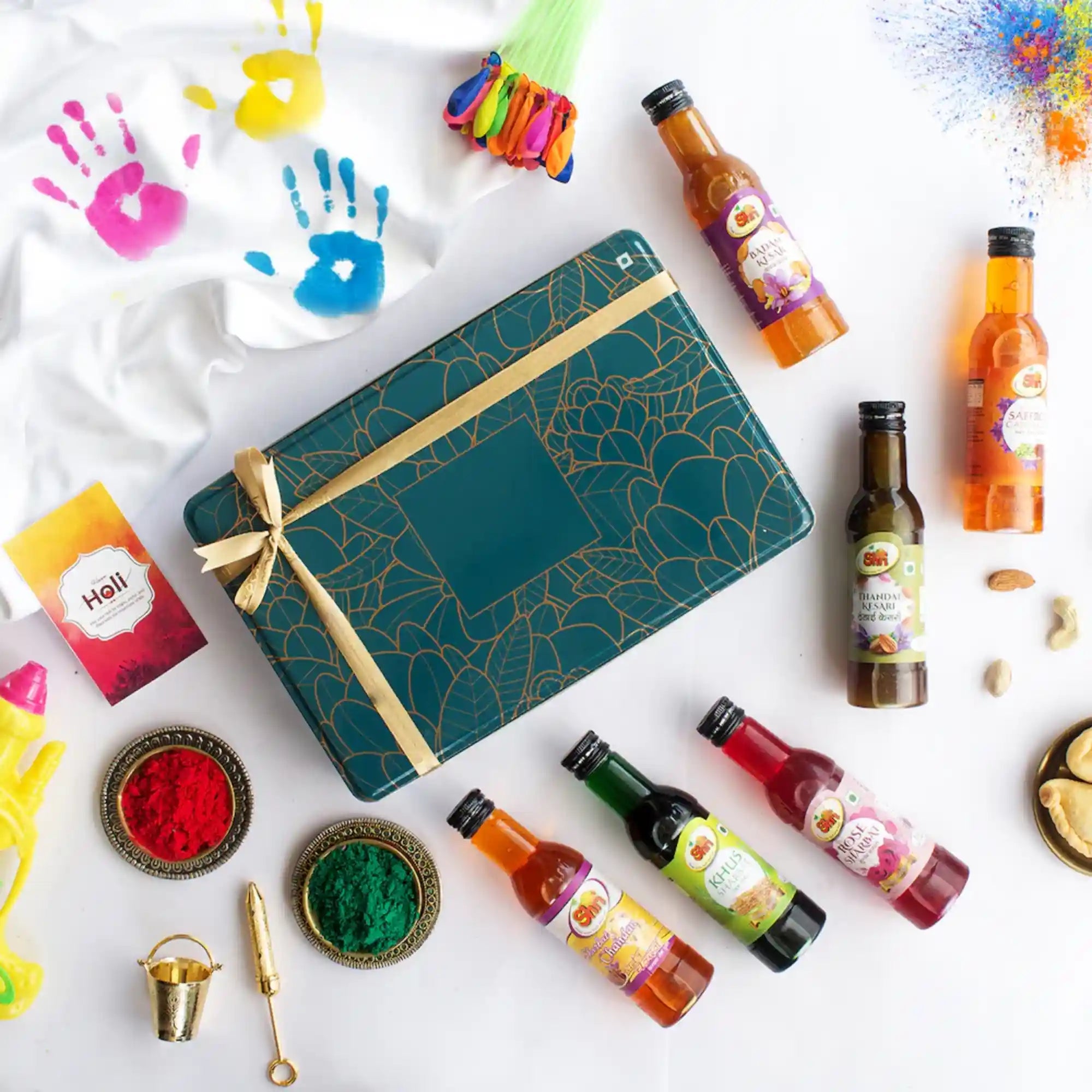 Festive Thandai Treats Box with Indian coolers and colorful powders for Holi celebrations
