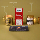 Giftech Global products including a candle, chocolate bar, and pistachios on a yellow background.