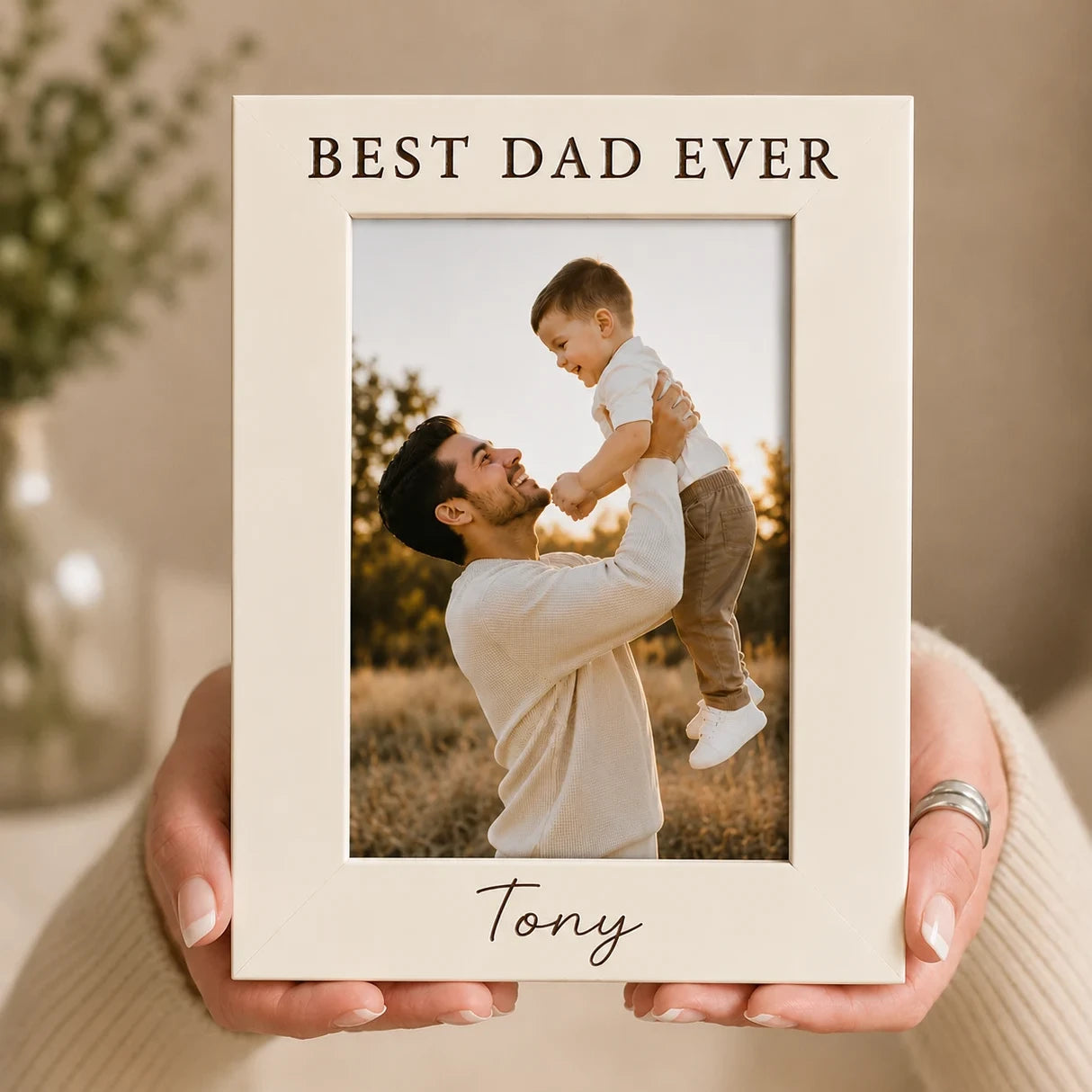 Beige photo frame with 'Best Dad Ever' text and a photo of a man holding a child.