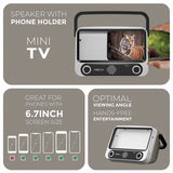 Mini TV with phone holder and speaker on a gray background